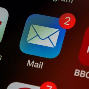 Closeup of an email icon on an electronic device.