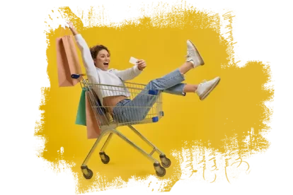 Lady in a shopping cart excited for Black Friday